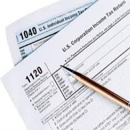 Tax forms with a pen